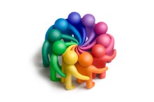 Multicolored plasticine human figures concluding an agreement on a white background